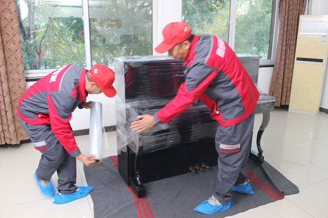 义乌乔喜搬家公司专业钢琴搬运现场